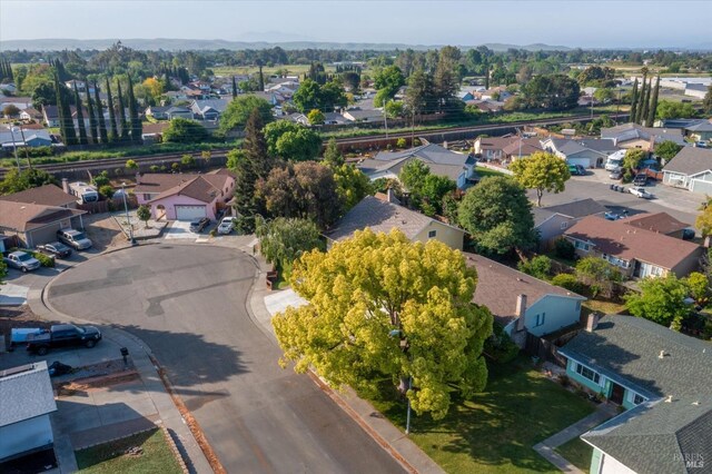 birds eye view of property with a residential view