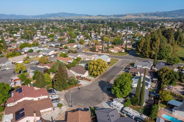 bird's eye view featuring a residential view and a mountain view