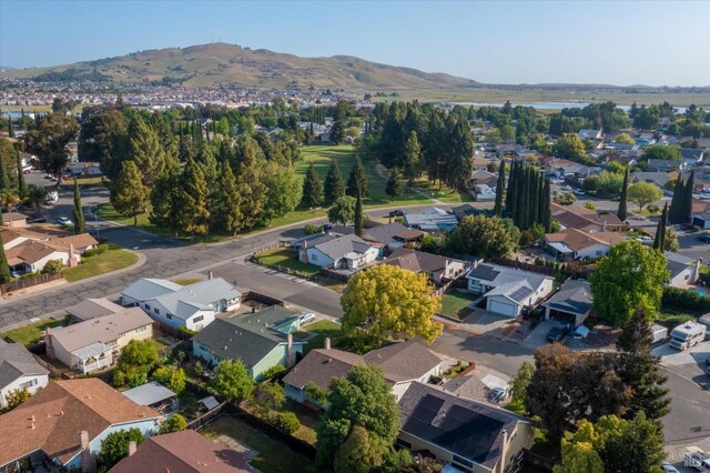 aerial view with a mountain view and a residential view