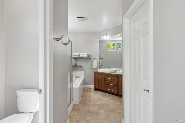 full bath featuring toilet, visible vents, a garden tub, and vanity