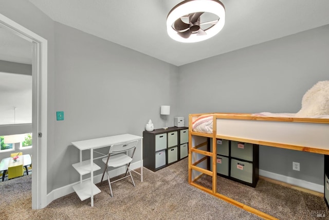 bedroom featuring carpet flooring and baseboards