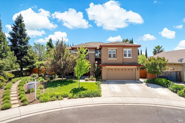 view of front of property featuring fence, stucco siding, an attached garage, driveway, and a tile roof