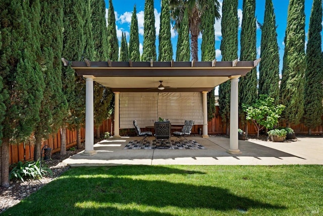 view of patio / terrace with ceiling fan and a fenced backyard