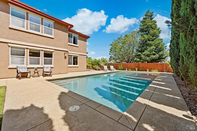 view of pool with a patio, fence, and a fenced in pool