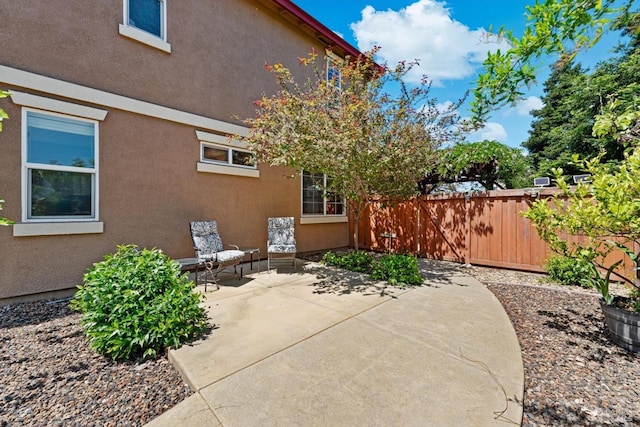 view of patio with fence