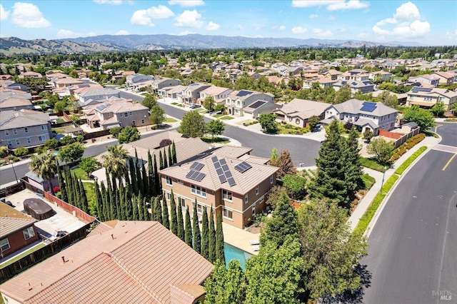 bird's eye view with a residential view and a mountain view
