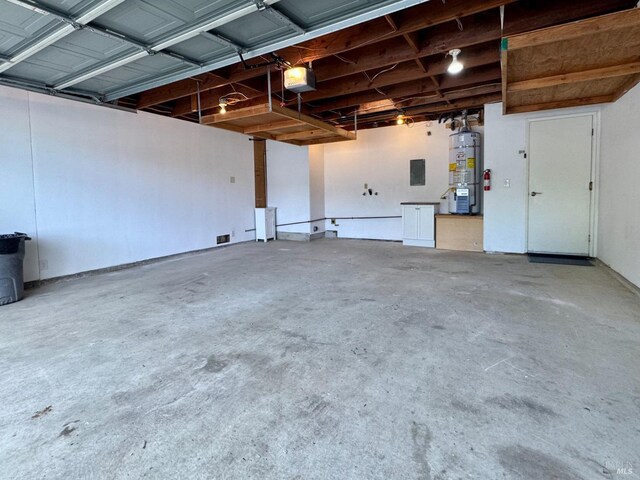 garage with secured water heater and a garage door opener