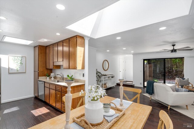 dining space featuring recessed lighting, baseboards, and dark wood finished floors