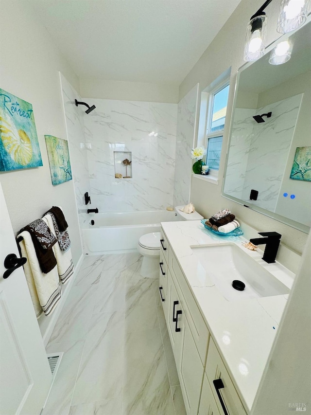 19 4th St, Richmond, CA 94801 - full bath with vanity, marble finish floors, toilet, and shower / washtub combination