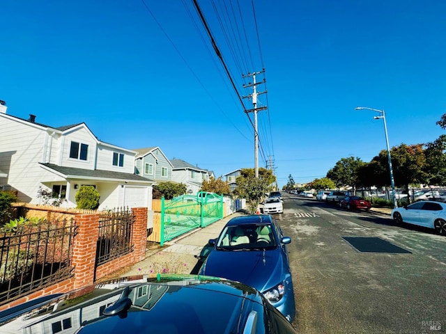 19 4th St, Richmond, CA 94801 - view of asphalt road with street lighting and a residential view