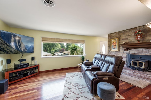 186 Easy St, Willits, CA 95490 - living room featuring wood finished floors, a wood stove, and baseboards