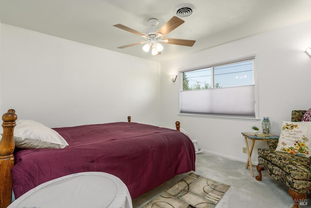bedroom featuring carpet floors, baseboards, ceiling fan, and visible vents