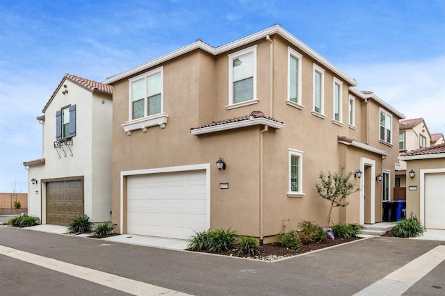 10592 Trill Way, Elk Grove, CA 95757 - view of property with stucco siding, an attached garage, and a tile roof