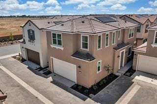 10592 Trill Way, Elk Grove, CA 95757 - exterior space with an attached garage and stucco siding