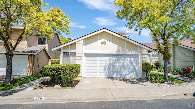 view of front of home featuring a garage and driveway