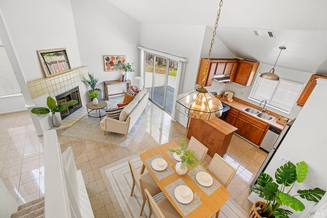 interior space with visible vents, granite finish floor, and a fireplace
