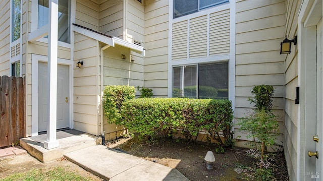 property entrance featuring fence