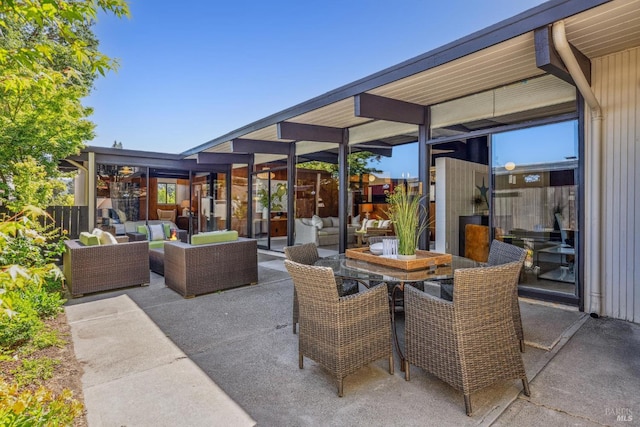 view of patio / terrace with an outdoor living space and outdoor dining area