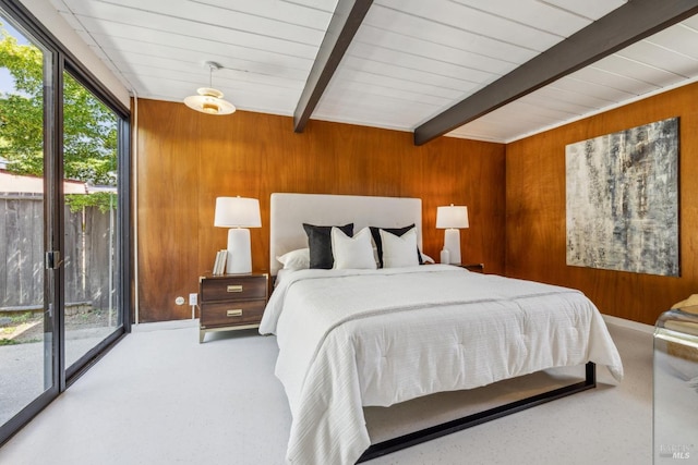 bedroom featuring wood walls, access to exterior, beam ceiling, and carpet flooring