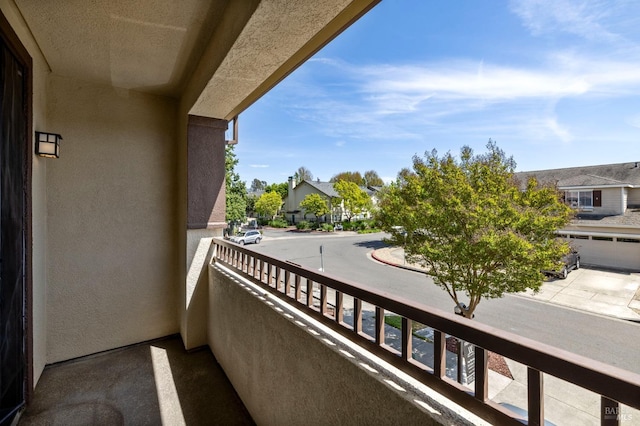 balcony featuring a residential view