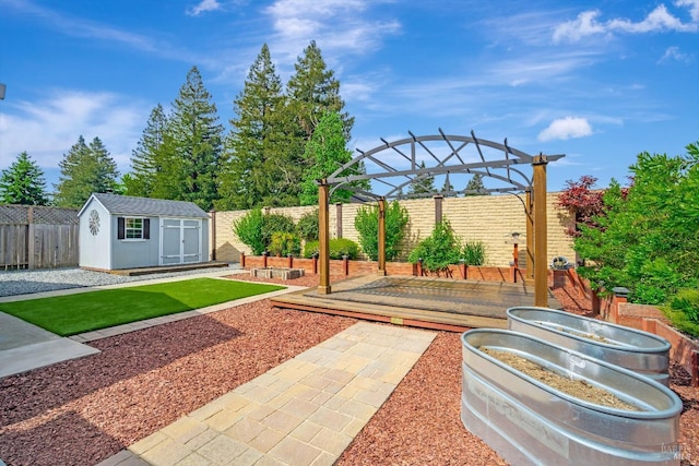 view of patio with a storage unit, a pergola, a vegetable garden, a fenced backyard, and an outdoor structure