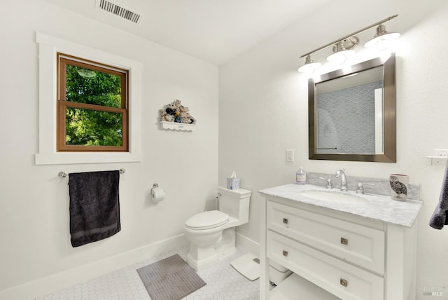 151 Randolph St, Napa, CA 94559 - half bath with toilet, visible vents, baseboards, tile patterned flooring, and vanity