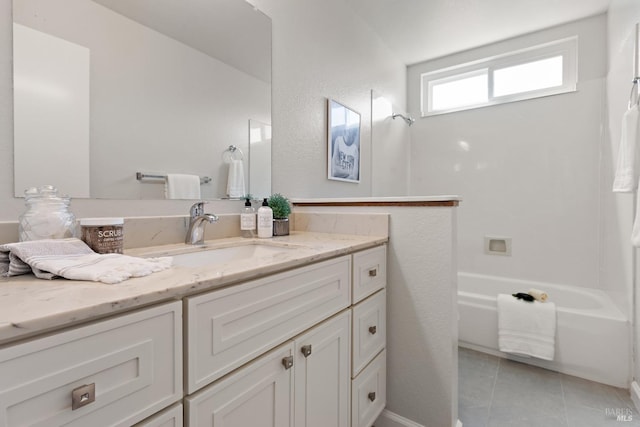 bathroom with shower / bath combination, tile patterned flooring, and vanity