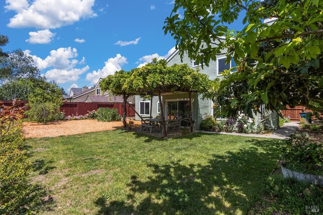 exterior space with fence private yard and a patio