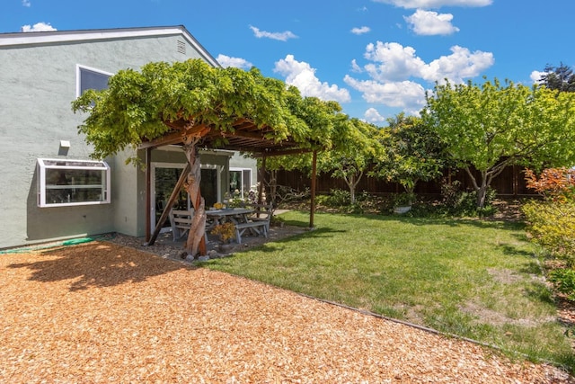 view of yard with fence and a patio