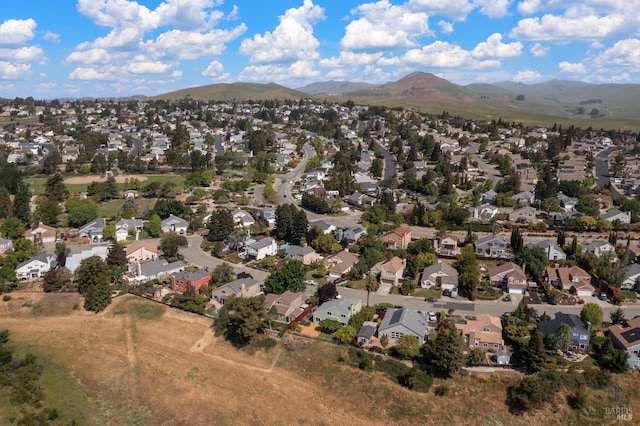 drone / aerial view with a mountain view and a residential view