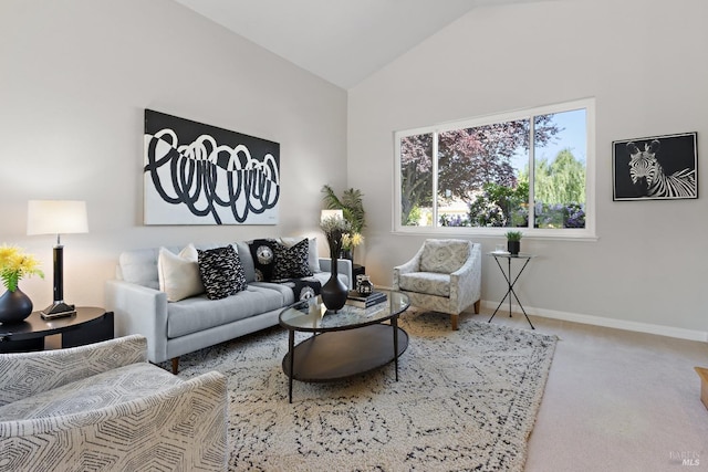 living room featuring carpet floors, baseboards, and high vaulted ceiling