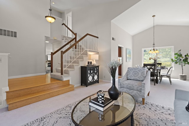 living room featuring high vaulted ceiling, baseboards, stairs, and carpet floors