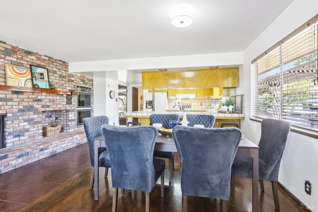 dining area with wood finished floors