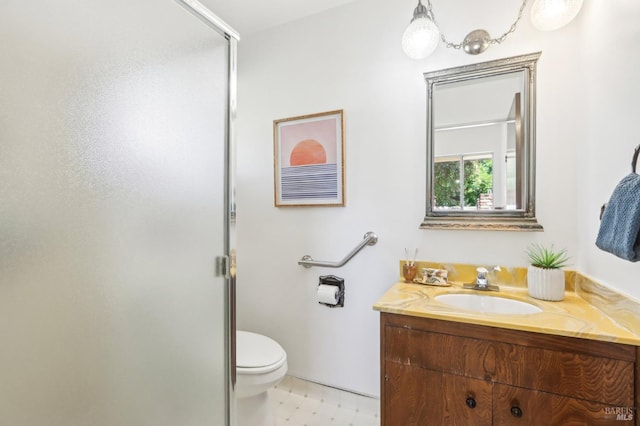 full bathroom with toilet, tile patterned floors, a shower stall, and vanity