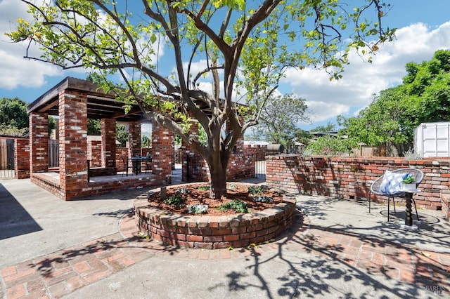 view of patio / terrace with fence