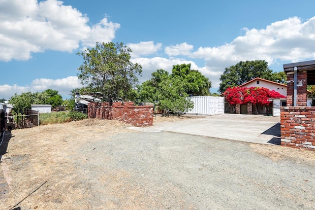 635 E 5th St, Benicia, CA 94510 - view of yard featuring fence and a gate