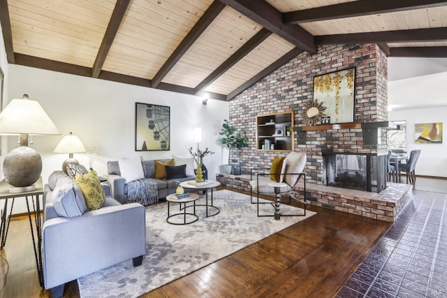 living area featuring wood ceiling, vaulted ceiling with beams, baseboards, and a brick fireplace