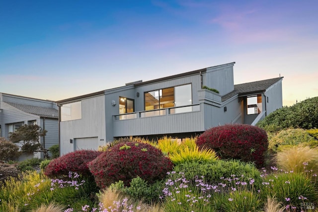 21158 Heron Dr, Bodega Bay, CA 94923 - contemporary house featuring a balcony and a garage