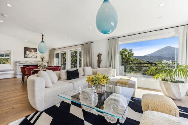 30 Corte Sereno, Greenbrae, CA 94904 - living room featuring a mountain view, plenty of natural light, wood finished floors, and recessed lighting
