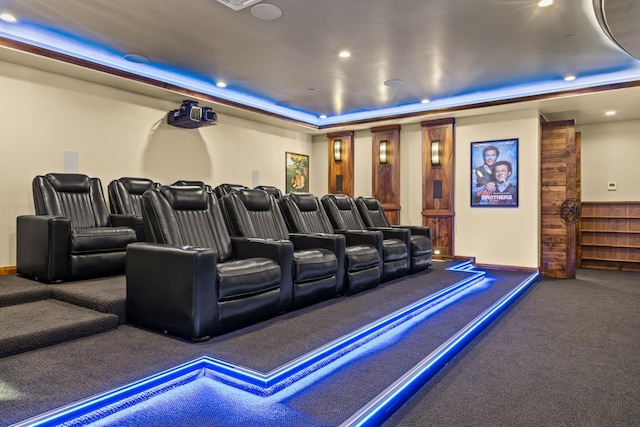 cinema with carpet flooring, recessed lighting, and a tray ceiling