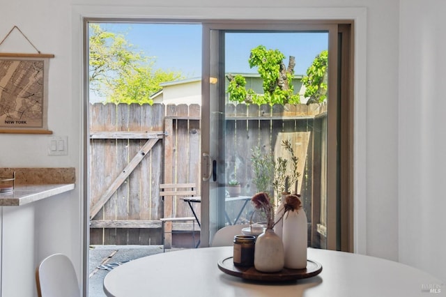 dining room featuring plenty of natural light