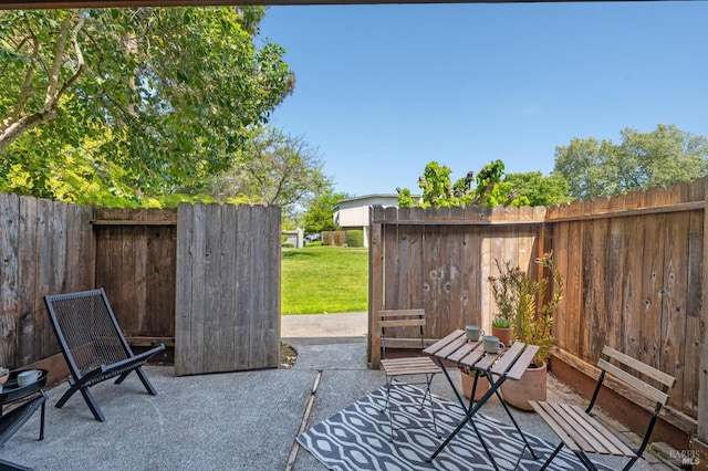 view of patio with fence