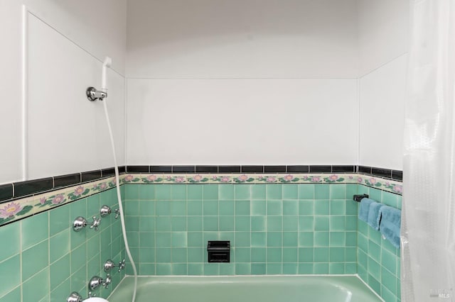 1722 Elm St, Napa, CA 94559 - bathroom featuring a tub, wainscoting, and tile walls