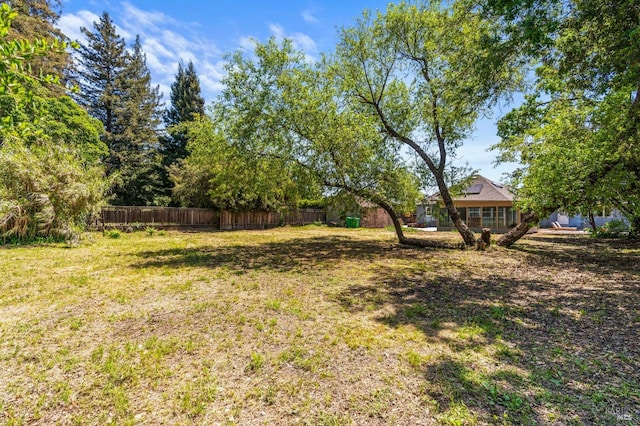 view of yard featuring fence