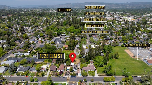 birds eye view of property featuring a mountain view