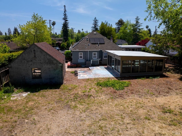 1722 Elm St, Napa, CA 94559 - back of house featuring a sunroom, a patio, and solar panels