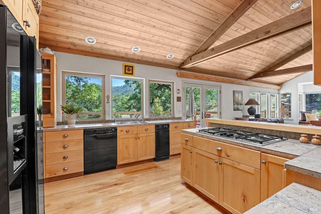 kitchen featuring light brown cabinetry, a wealth of natural light, vaulted ceiling with beams, wooden ceiling, and black appliances