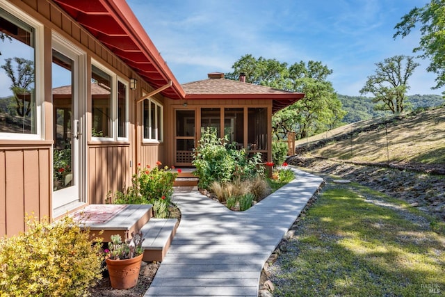 exterior space with a sunroom