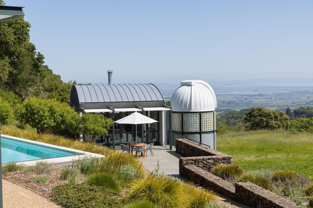 pool featuring a gazebo and a patio area