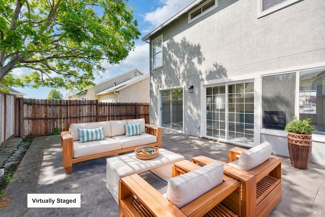 view of patio with a fenced backyard and an outdoor living space